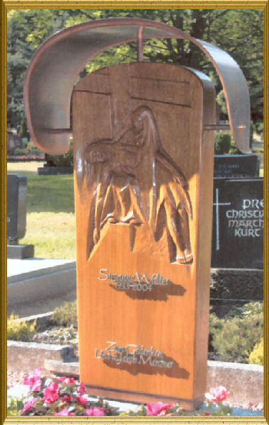 Tomb of oak with a relief carving Pieta